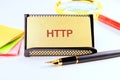 Exploring the concept of HTTP with stationery items on a desk