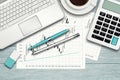 Workspace with graph, computer, graph, calculator and stationery Royalty Free Stock Photo