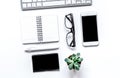 Workspace with keyboard and mobile office desk white background top view mock up Royalty Free Stock Photo
