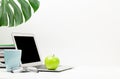 Workspace with laptop computer, apple and coffee Royalty Free Stock Photo