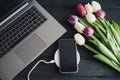 Workspace with laptop and smartphone, Kraft envelope, pen and white sheet. Royalty Free Stock Photo