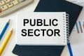 Public Sector is written on a notepad Royalty Free Stock Photo