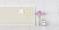 Workspace post it board stationery flowers and sticky notes on a chalkboard Home desk and notepad on white wall Copy space for Royalty Free Stock Photo