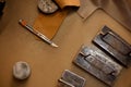 Workspace Showcasing Leathercrafting Tools and Materials Royalty Free Stock Photo