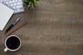 Workspace of Wood office desk table with keyboard, notebook and coffee cup with equipment other office supplies. Business and fina Royalty Free Stock Photo