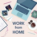 Workplace top wiev. Home office and quarantine concept. Desk with laptop, cup of coffee, pencils and  text Work from home Royalty Free Stock Photo