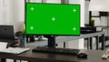 Workstation with greenscreen monitor Royalty Free Stock Photo