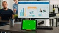 Workstation with greenscreen on tablet Royalty Free Stock Photo