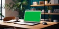 workstation setup, laptop on desk, horizontal view layout mockup with green screen laptop, ai generated Royalty Free Stock Photo