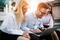 Workteam in office working together on laptop Royalty Free Stock Photo