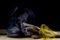 Workwear for a construction worker. Helmet, gloves, shoes and sunglasses on a wooden table. Royalty Free Stock Photo