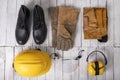 Workwear for a production worker on a white table. Personal protective accessories used at work Royalty Free Stock Photo