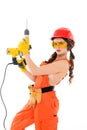 workwoman in overalls and hardhat holding electric drills, Royalty Free Stock Photo