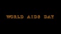 World Aids Day fire text effect black background Royalty Free Stock Photo