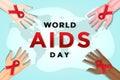 world aids day with 4 hands have a bow ribbon