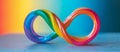 World autism awareness day background. Rainbow colored infinity on blue background. Infinity is symbol of autism Royalty Free Stock Photo