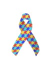 World Autism Awareness day with puzzle or jigsaw pattern ribbon isolated with clipping path on white background Royalty Free Stock Photo