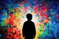 Autism Awareness Day, the silhouette of a child against the background of a multi-colored puzzle piece Royalty Free Stock Photo
