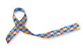 World Autism awareness day WAAD: Colorful Puzzle fabric ribbon logo isolated clipping path on white background Royalty Free Stock Photo