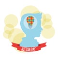 World autism day with child profile and bulb puzzle