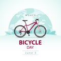 World Bicycle Day on the background of a globe with a bike and leaves