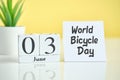 World Bicycle Day 03 third june Month Calendar Concept on Wooden Blocks