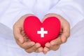 World Blood Donor Day, June 14. Doctor hands holding red heart Royalty Free Stock Photo