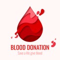 World Blood Donor Day - red paper cut blood drop Royalty Free Stock Photo