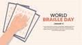 World braille day background with a hand reading braille on paper Royalty Free Stock Photo