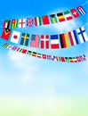 World bunting flags on blue sky. Royalty Free Stock Photo