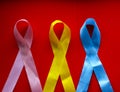 World cancer day. Bright colored ribbon - symbol of fight against cancer and hope for recovery from cancer. International Agency