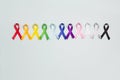 World cancer day concept, February 4. Colorful awareness ribbons on blue background