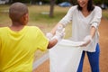 The world that the children made. a woman and boy picking up trash in a park. Royalty Free Stock Photo