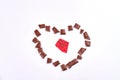 World chocolate day. Chocolate piece in the shape of heart.