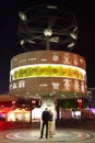 World clock in Berlin at night, couple Royalty Free Stock Photo