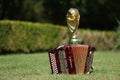 World cup trophy and Hohner bayan