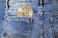 World currency, dollar rate, one dollar coin in jeans pocket Royalty Free Stock Photo