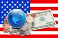 World currency - globe with money over USA banner Royalty Free Stock Photo