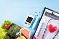 World diabetes day and healthcare concept. Patient`s blood sugar control, diabetic measurement, and healthy food eating nutrition Royalty Free Stock Photo