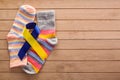 World Down syndrome day background. Down syndrome awareness concept. Socks and ribbon on wooden background