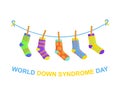 World Down syndrome day banner. Different colorful odd socks hanging on the rope as a symbol for WDSD. Vector cartoon illustration