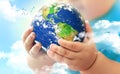 World earth in baby`s hands