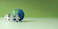 World Earth Day Concept. Green Energy, ESG, Renewable and Sustainable Resources. Environmental Care. Paper Cut as Group of People Royalty Free Stock Photo