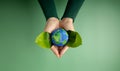 World Earth Day Concept. Green Energy, ESG, Renewable and Sustainable Resources. Environmental and Ecology Care. Hands of Person Royalty Free Stock Photo