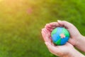 World Earth Day concept. Woman hand holding handmade globe Royalty Free Stock Photo