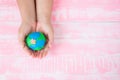 World Earth Day concept. Woman hand holding handmade globe Royalty Free Stock Photo