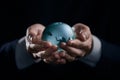 world, earth, planet, business concept glass earth globe in the hands Royalty Free Stock Photo