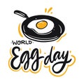 World Egg Day hand drawn vector lettering and pan with egg illustration. Isolated on white background. Royalty Free Stock Photo