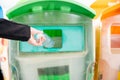 Business woman throwing empty plastic bottle water into recycle garbage trash Royalty Free Stock Photo