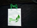 World Environment Day with leaves on ECO Friendly white bag on black background